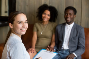 Licensed Marriage & Family Therapist in a counseling session with a married couple.