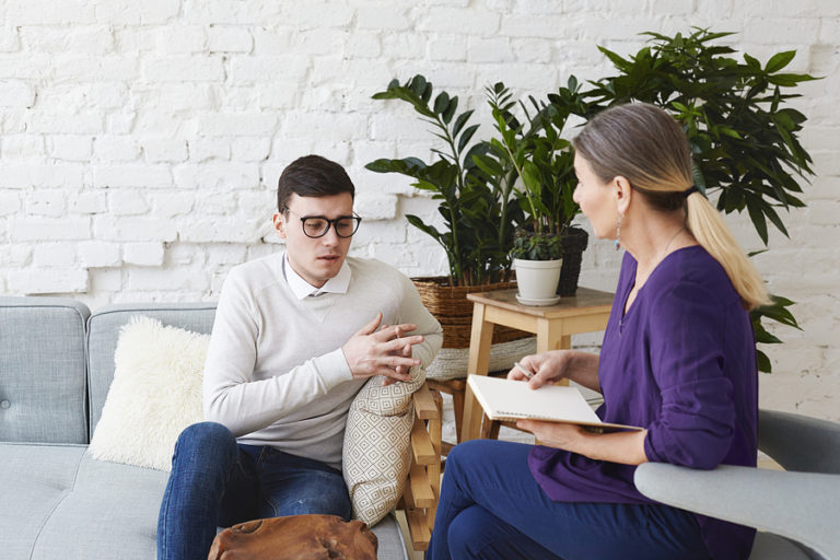 Therapist in a session with a client