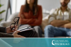 A counselor meets with a family in an office.