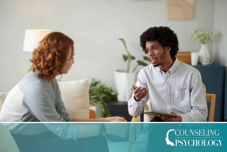 A counselor with a specialty certification meets with a patient.