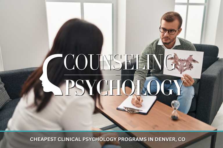 A psychologist sits in front of a patient and holds an image while taking notes on the patient's response.
